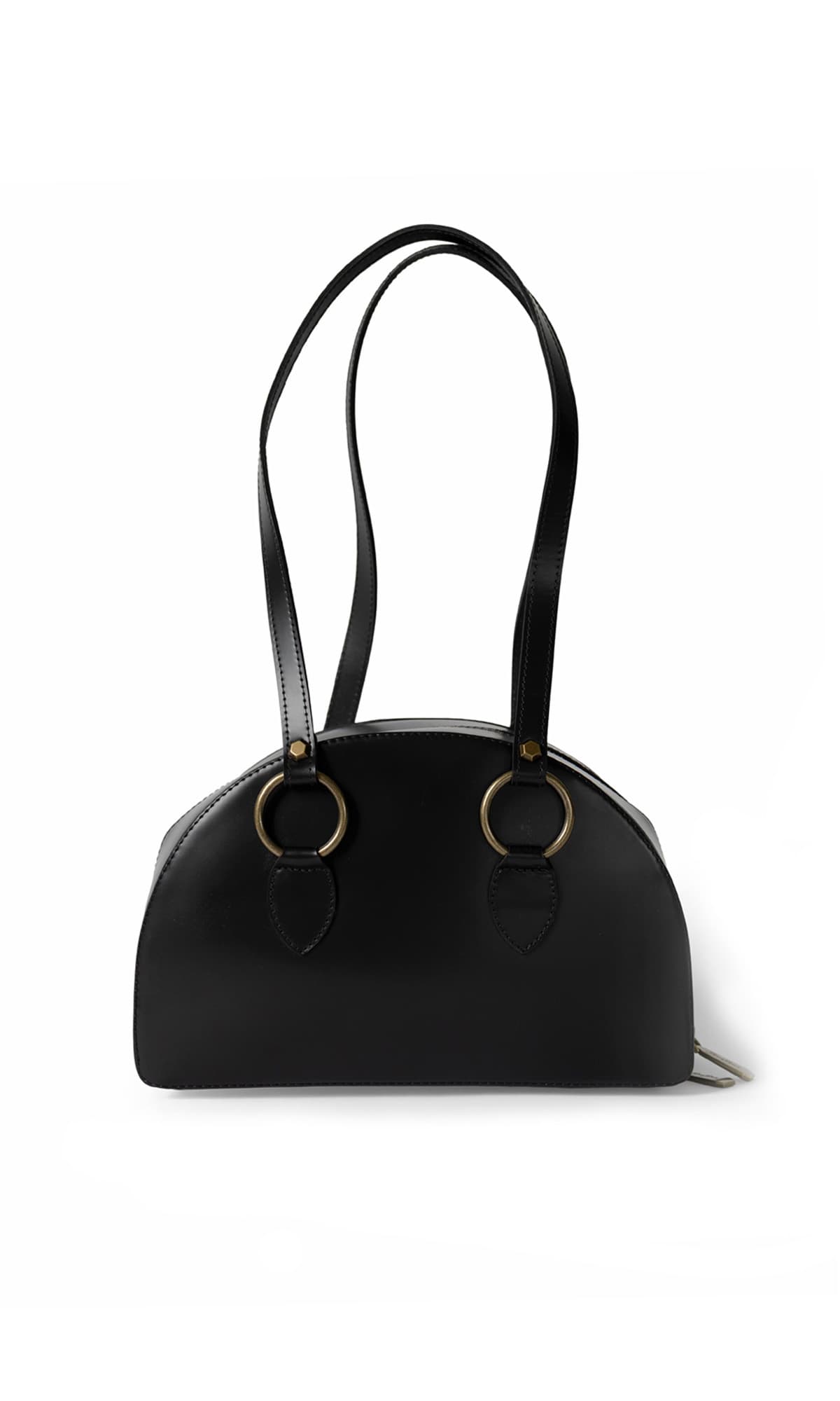 Rebecca Retro Bowling Bag in black leather — model holding the bag at her side, showing the structured silhouette, smooth leather and everyday scale